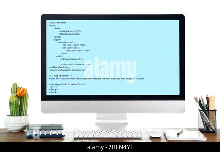 Programming code on computer monitor Stock Photo