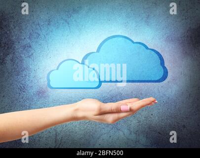 Virtual clouds on hand. Cloud storage concept with copy space Stock Photo