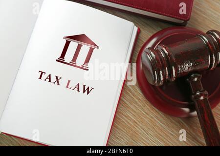 Open book with words tax law Stock Photo
