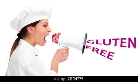 Young woman chef with megaphone and text Gluten Free isolated on white Stock Photo