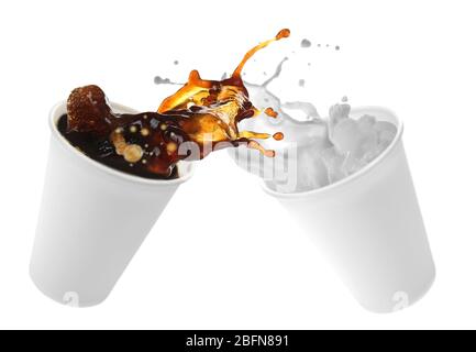 Paper cups with milk and coffee splashes on white background Stock Photo
