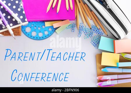 Stationary with text PARENT/TEACHER CONFERENCE on white background. School concept. Stock Photo