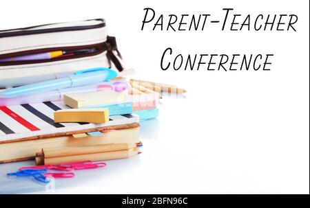 Stationary with text PARENT-TEACHER CONFERENCE on white background. School concept. Stock Photo