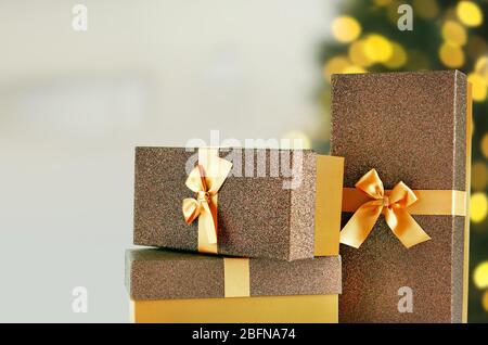 Beautiful Christmas gifts on blurred background Stock Photo