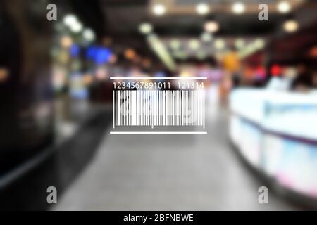 Barcode on blurred shopping mall background. Wholesale and retail concept. Stock Photo