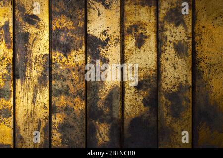 Grunge worn textured copper and gold background Stock Photo