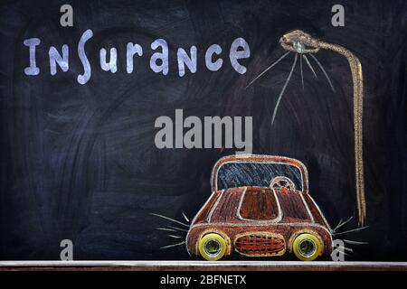 Car insurance concept. Car drawing on blackboard Stock Photo