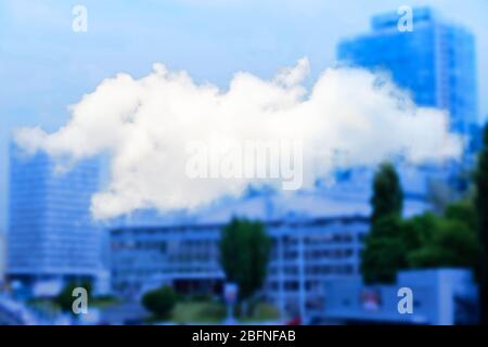 Cloud icon on blurred cityscape background. Modern technology concept Stock Photo