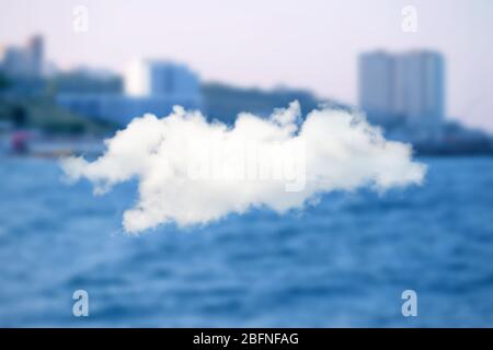 Cloud icon on blurred cityscape background. Modern technology concept Stock Photo