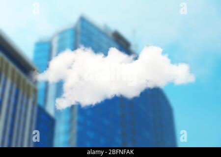 Cloud icon on blurred cityscape background. Modern technology concept Stock Photo