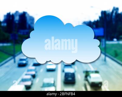 Cloud icon on blurred cityscape background. Modern technology concept Stock Photo