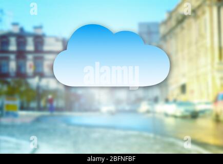 Cloud icon on blurred cityscape background. Modern technology concept Stock Photo