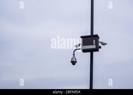 cctv security camera on a pole Stock Photo