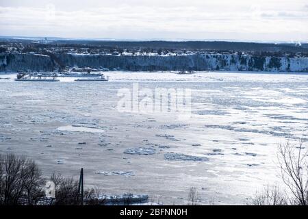 Frozen Saint Laurent river in Quebec city at winter time.  Nobody Stock Photo