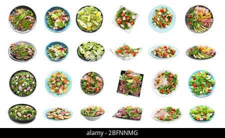 Set of different tasty salads on white background Stock Photo