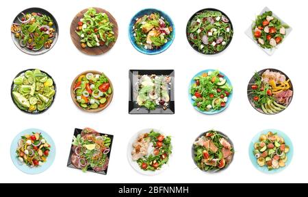 Set of different tasty salads on white background Stock Photo