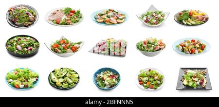 Set of different tasty salads on white background Stock Photo