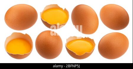 Whole and broken chicken eggs isolated on white background Stock Photo