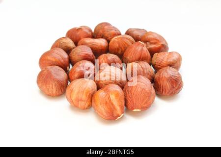 Peeled hazelnuts isolated on white background. No shell Stock Photo