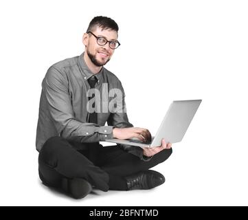 Handsome programmer with laptop on white background Stock Photo