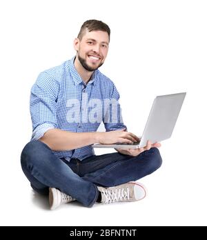 Handsome programmer with laptop on white background Stock Photo
