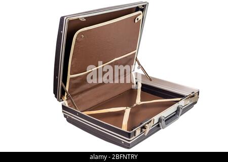 used and dirty old fashion black plastic suitcase or briefcase isolated on white background, open and lying, diagonal view Stock Photo