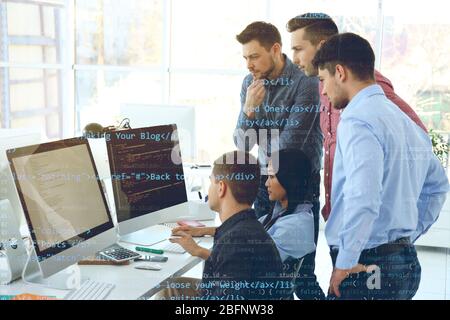 Program development concept. Young people working in office Stock Photo