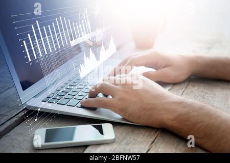 Man working with laptop. Modern technology concept Stock Photo