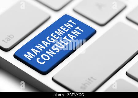 MANAGEMENT CONSULTANT button on keyboard, closeup Stock Photo