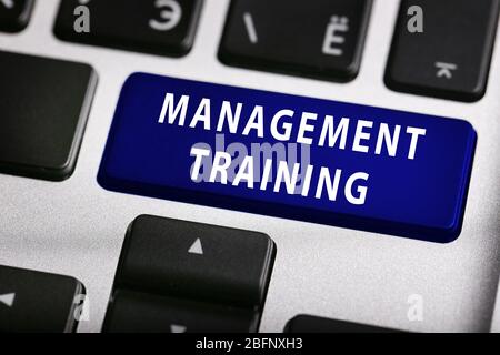 MANAGEMENT TRAINING button on keyboard, closeup Stock Photo