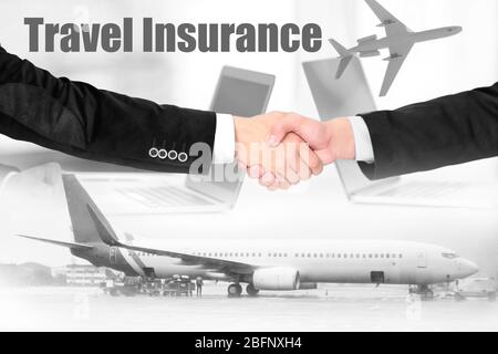 Travel insurance concept. Businessmen shaking hands and aircraft on background Stock Photo