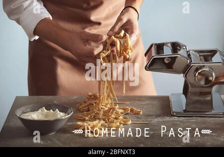 Man making homemade pasta Stock Photo