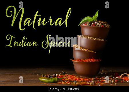 Natural Indian spices on black background Stock Photo