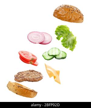 Floating ingredients for delicious burger on white background Stock Photo