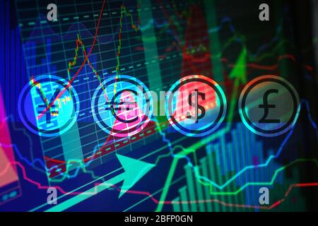 Stock exchange graphs with currency symbols on color background. Financial trading concept Stock Photo