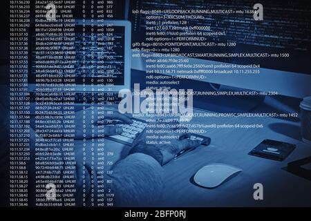 Hacker working with computer at table. Concept of cyber attack Stock Photo