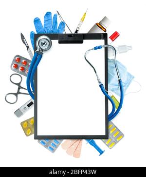 Black clipboard, stethoscope and other medical items isolated on white Stock Photo
