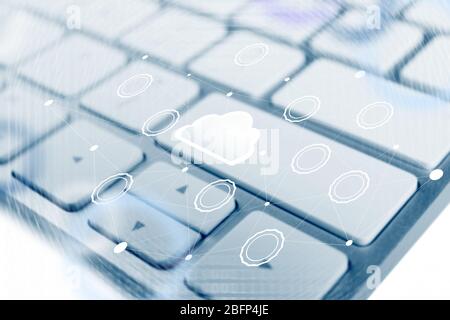 Computer keyboard with cloud data storage and multimedia icons Stock Photo