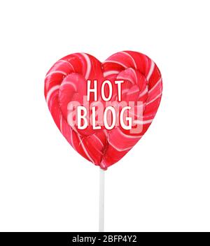 Heart shaped lollipop isolated on white. Hot blog concept Stock Photo