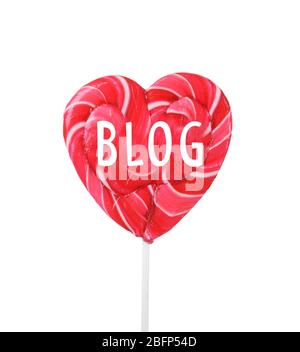 Heart shaped lollipop isolated on white. Blog concept Stock Photo