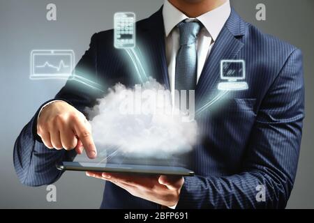Businessman working with a Cloud Computing diagram Stock Photo
