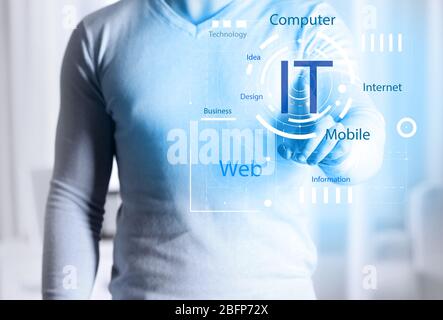 Male hand pushing button on virtual screen. IT technologies concept. Stock Photo