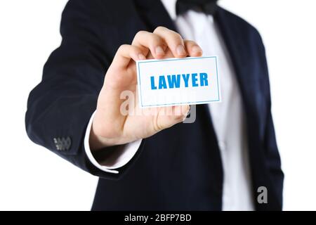 Elegant man in suit holding business card LAWYER, isolated on white Stock Photo