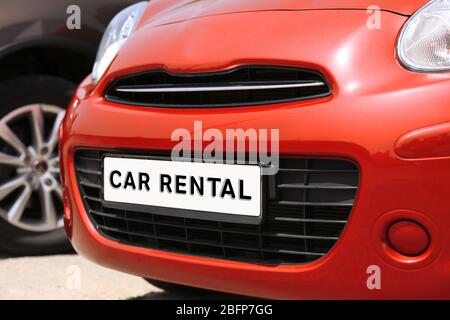 CAR RENTAL. Closeup license plate at the in front of car Stock Photo