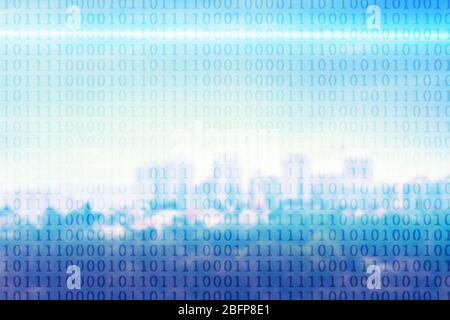 Binary code on blurred cityscape background. Stock Photo