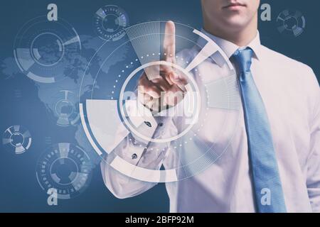 Businessman working with virtual screen. Technology concept. Stock Photo