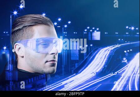 Technologies of the future concept. Man with futuristic glasses Stock Photo