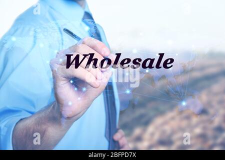 Wholesale concept. Young man on blurred background Stock Photo