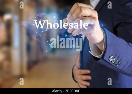 Wholesale concept. Young man on blurred background Stock Photo
