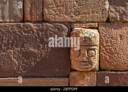 Close up of a Carved Stone Head in the Semi Subterranean Courtyard Temple of Tiwanaku, La Paz, Bolivia. Stock Photo